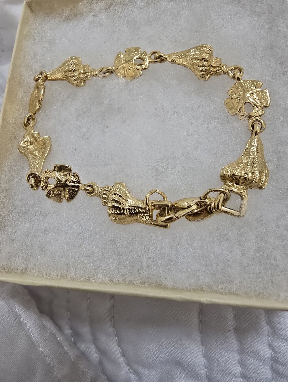 Beaitiful Gold Toned Shell Charm Bracelet - Conk And Sand Dollars